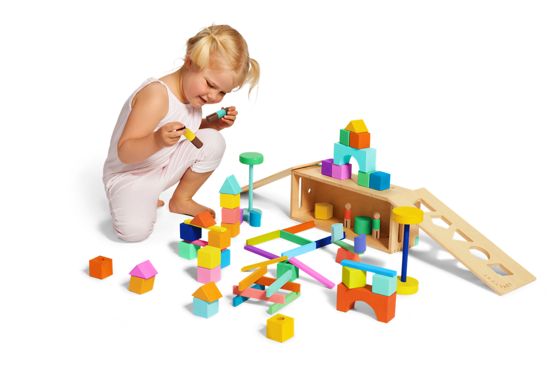 Child playing with The Block Set by Lovevery
