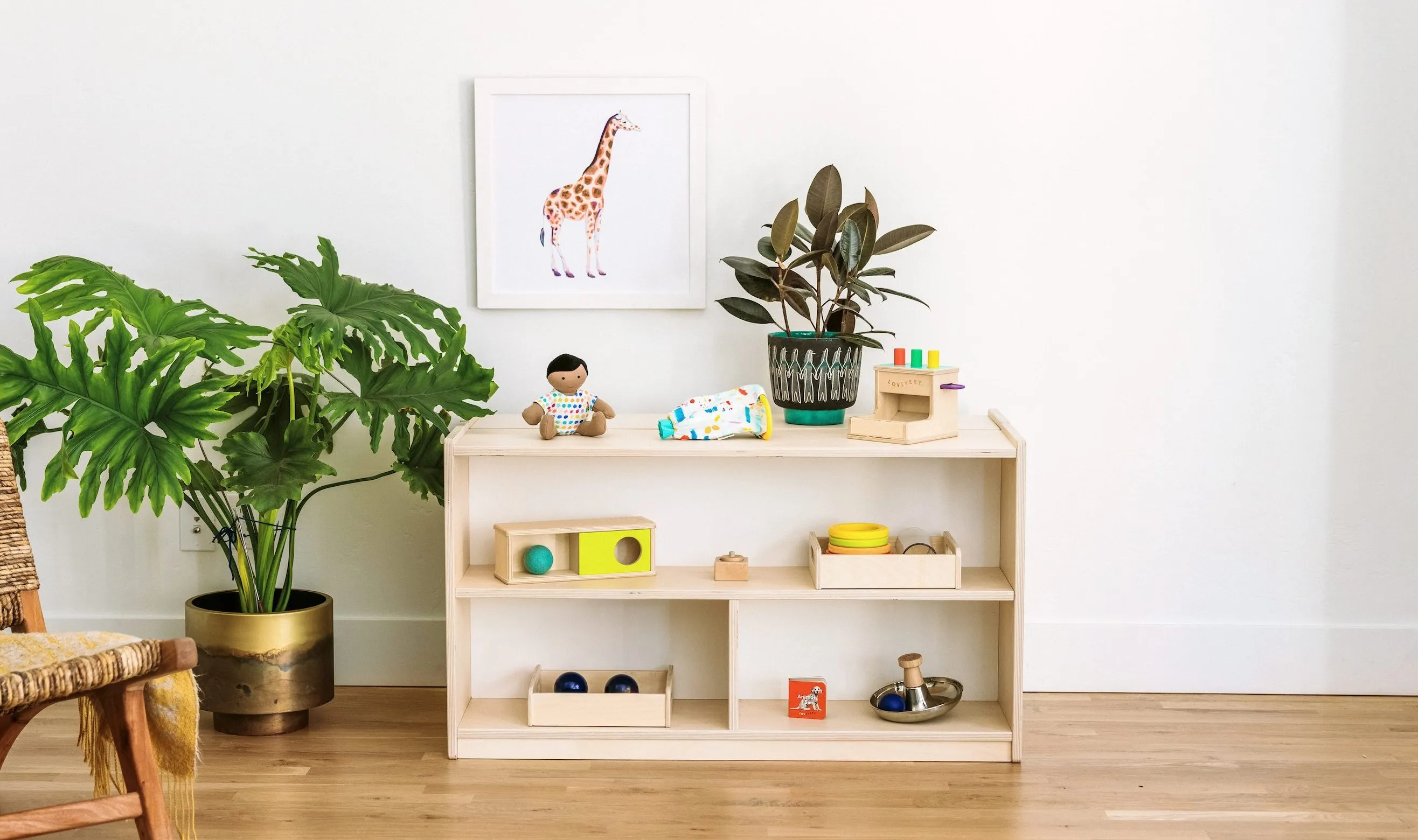 The Montessori Shelf filled with Lovevery playthings